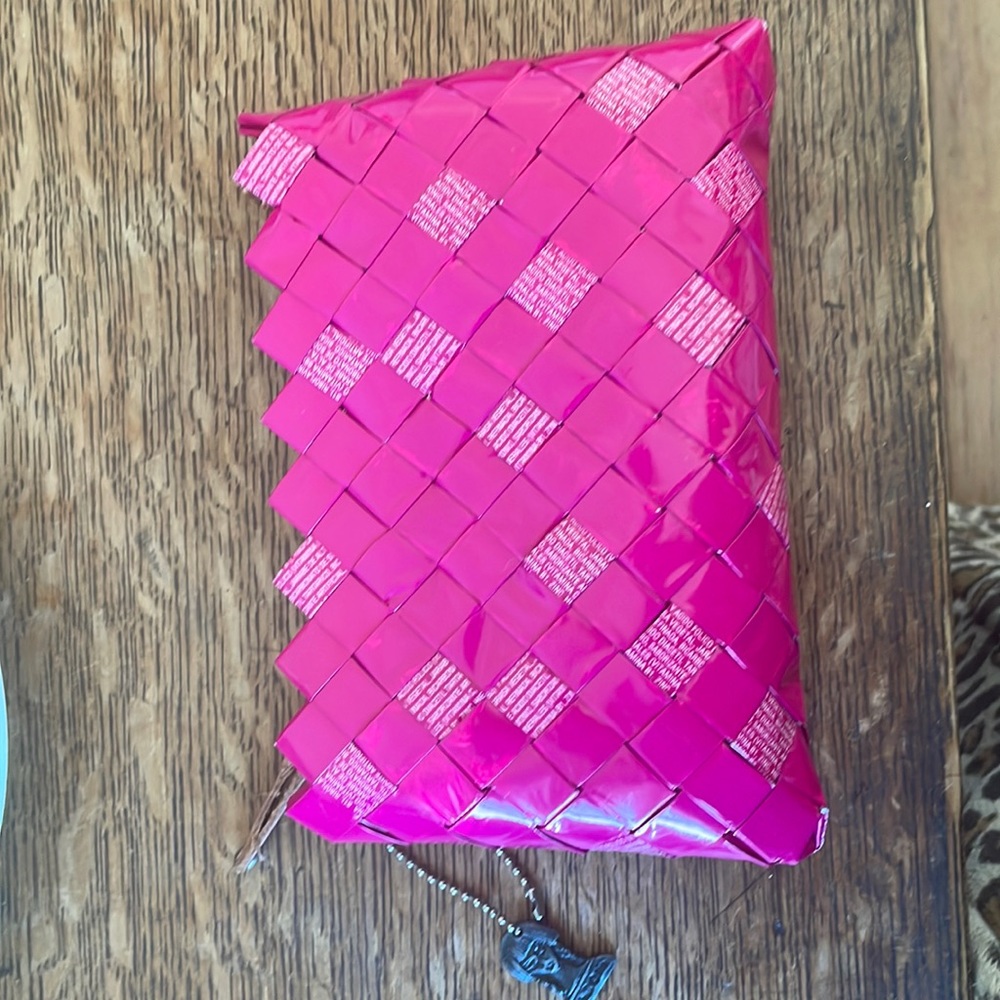 Pretty pink clutch- made of recycled materials! Ready for your Barbie moment.